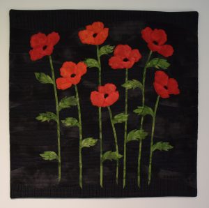 poppy-pa-svart60x60